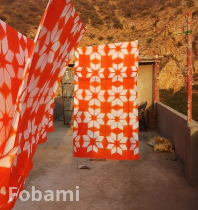 Africa Adire with Orange and White Design